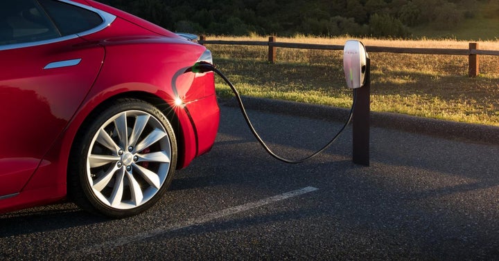 Why Tesla Accepting Bitcoin Is 'Seminal Moment' For EV Stock, Crypto World